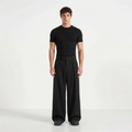 Wide leg pleated tailored trousers in Black