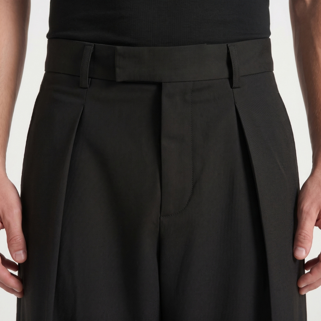 Wide leg pleated tailored trousers in Black
